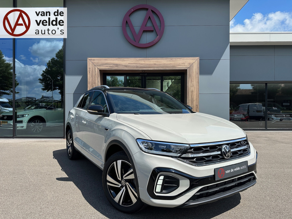 tweedehands Volkswagen T-Roc 1.5 TSI 150pk DSG R-Line | Camera | Keyless | Elek. Achterklep | Dode hoek | Rijklaar incl. 1 jaar Bovag garantie   – beschikbaar bij Van de Velde Auto’s