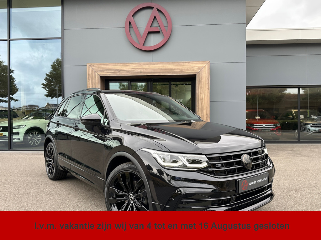 tweedehands Volkswagen Tiguan 1.5 TSI 150pk DSG R-Line | Black Style | Leder | Trekhaak | Harman/Kardon | 20 inch | Rijklaar incl. garantie   – beschikbaar bij Van de Velde Auto’s